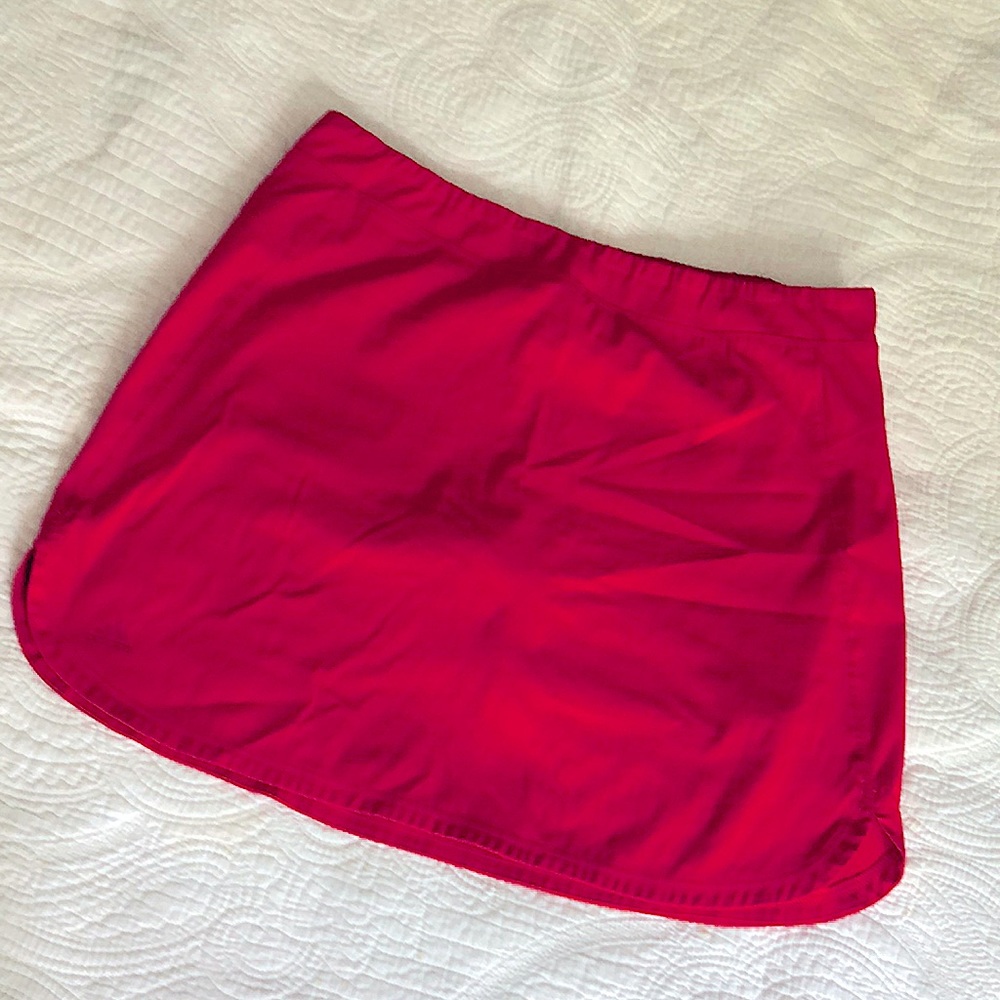 Adidas red tennis athletic shirt with shorts attached and back pocket